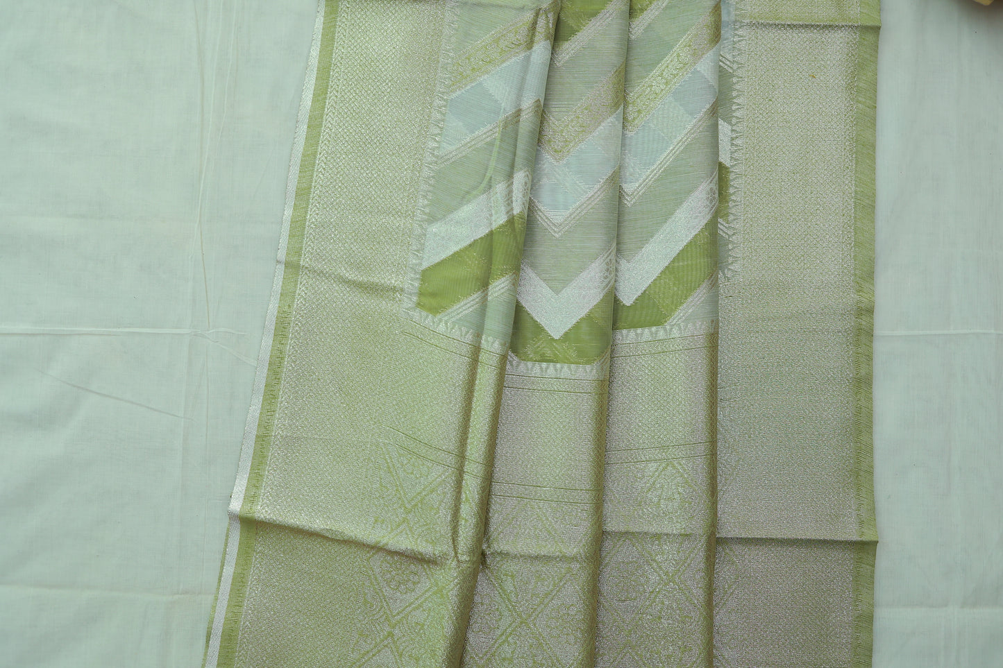 KS45 - Moss Green and White textured silk blended saree