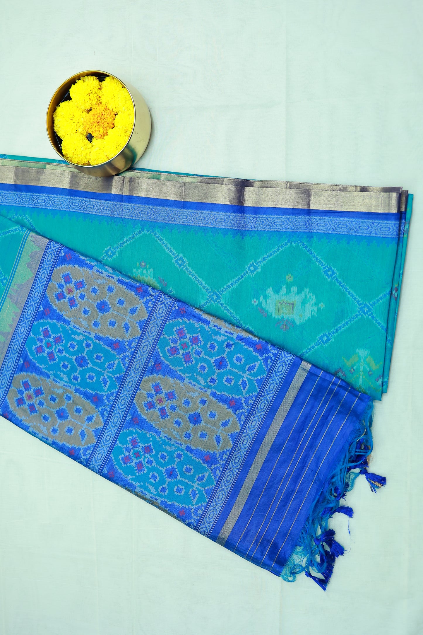 KS87 -A rich  teal or turquoise blue base Pochampally Ikat sarees