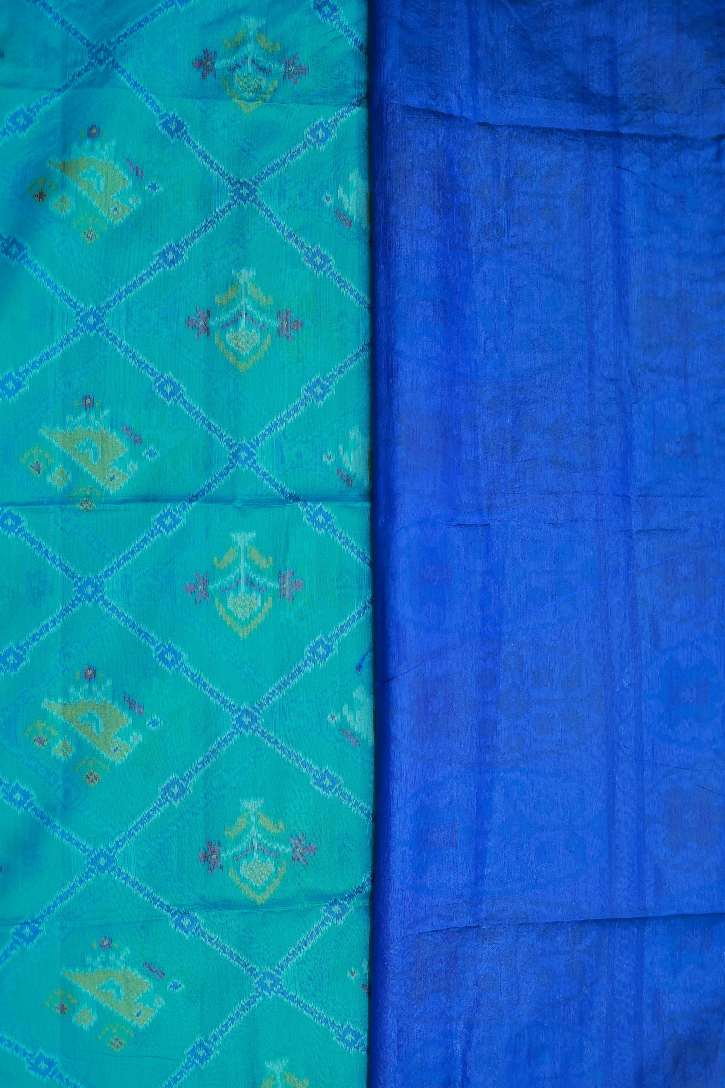 KS87 -A rich  teal or turquoise blue base Pochampally Ikat sarees