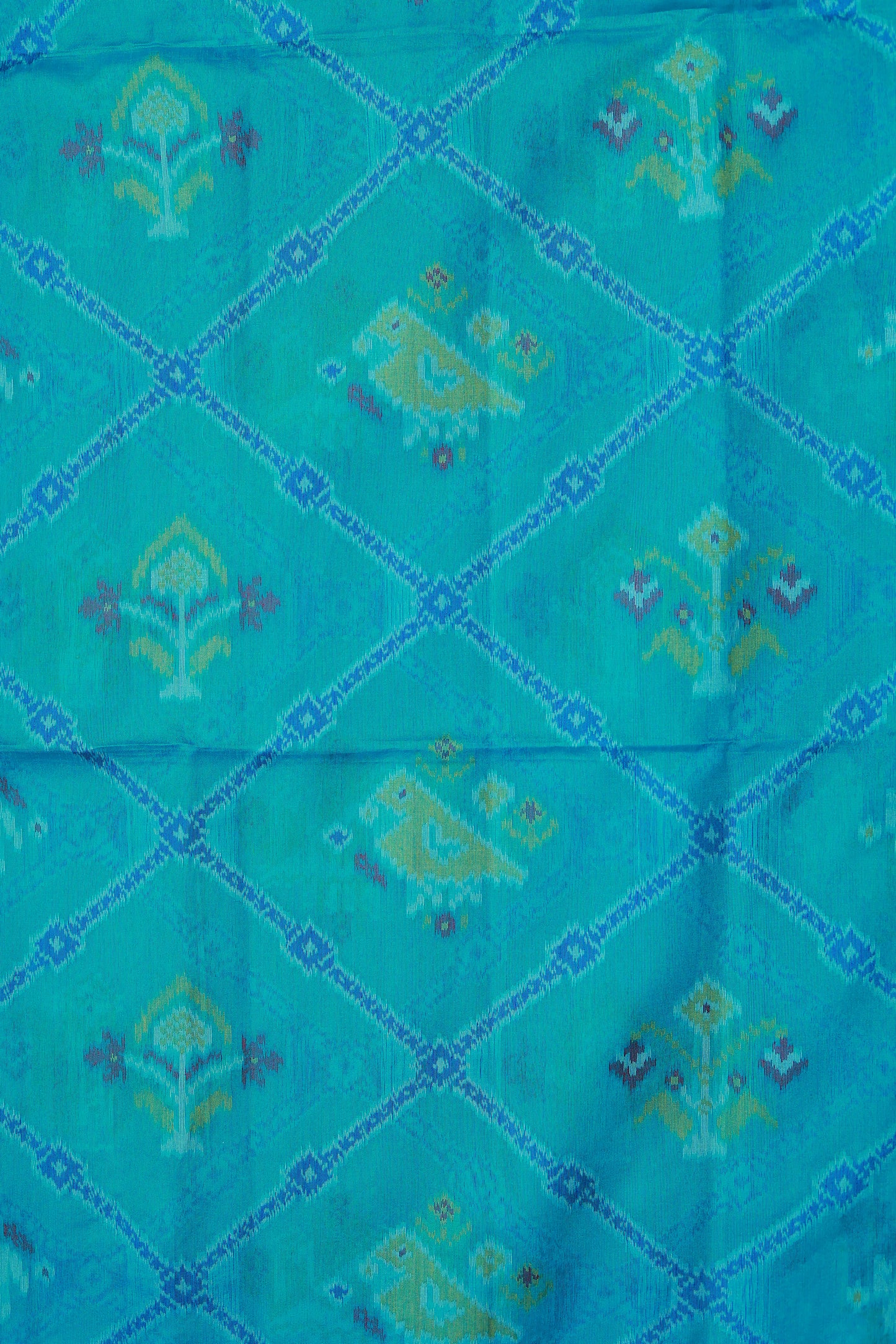 KS87 -A rich  teal or turquoise blue base Pochampally Ikat sarees